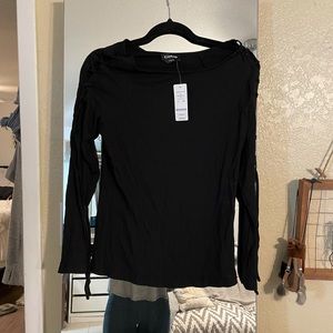 Women’s black bebe top